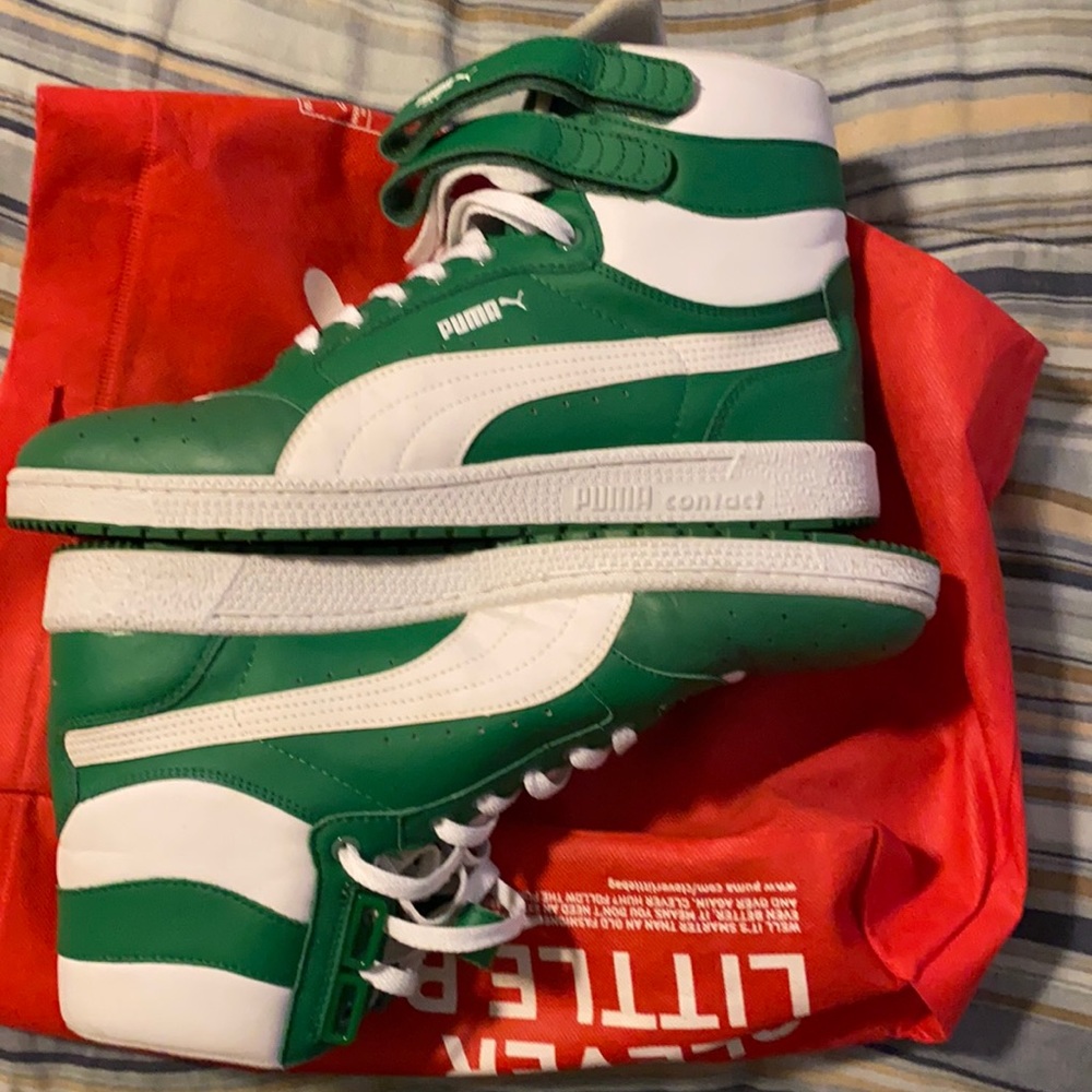 Gently used Puma Sky green and white.